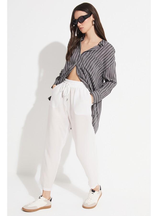 جون بنطلون جينز نسائي من مودال بمقاس مرن وخصر مطاطي بلون إيكرو - Image 5