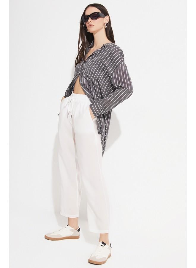 جون بنطلون جينز نسائي من مودال بمقاس مرن وخصر مطاطي بلون إيكرو - Image 4