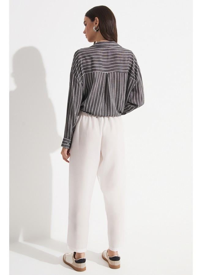 جون بنطلون جينز نسائي من مودال بمقاس مرن وخصر مطاطي بلون إيكرو - Image 2