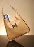 صوص هاوت Camel Brown