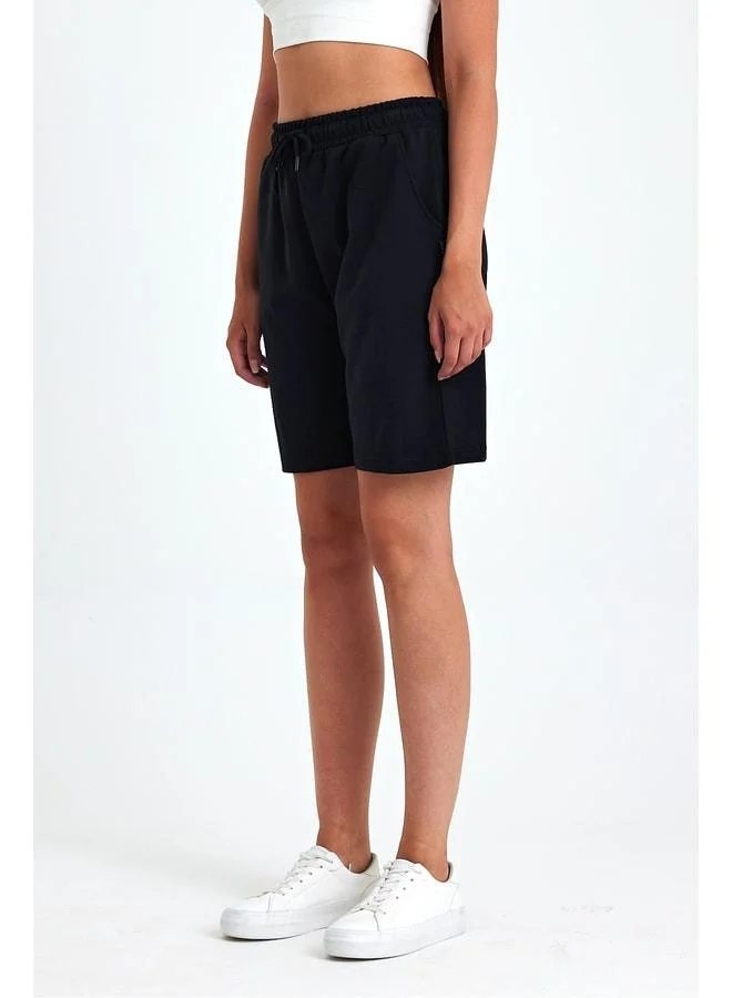Mmetalic  Women's Relaxed-Fit Black Long Bermuda Shorts with Elastic Waist, Soft Seasonal Fabric, and Pockets for Women | Best Price UAE