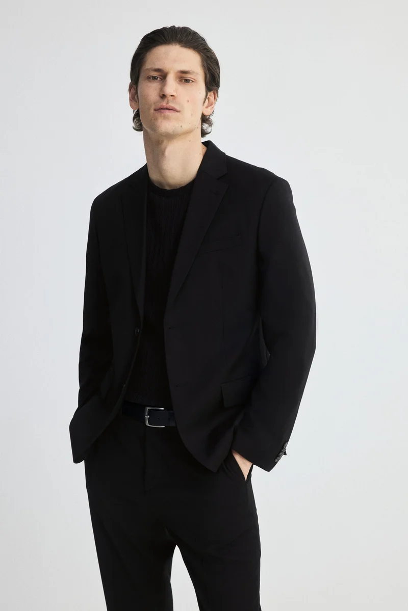 اتش اند ام جاكيت بصف أزرار فردي وبقصّة عادية