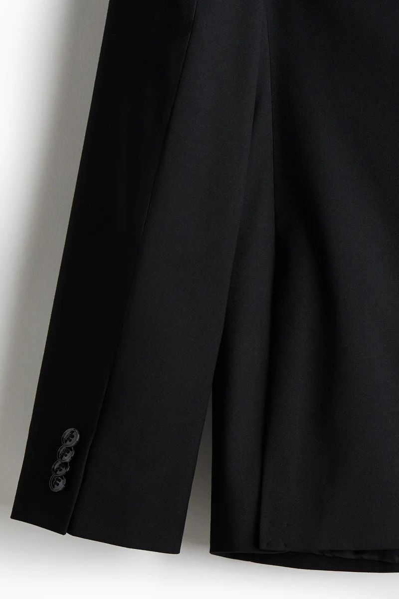 اتش اند ام جاكيت بصف أزرار فردي وبقصّة عادية