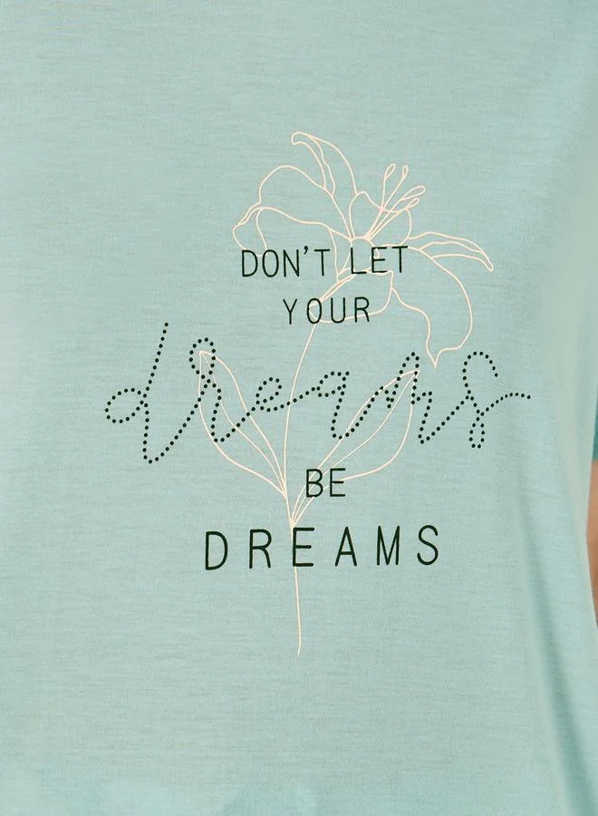 Styli Dreams Slogan T-Shirt and Floral Ruffled Hem Shorts Set