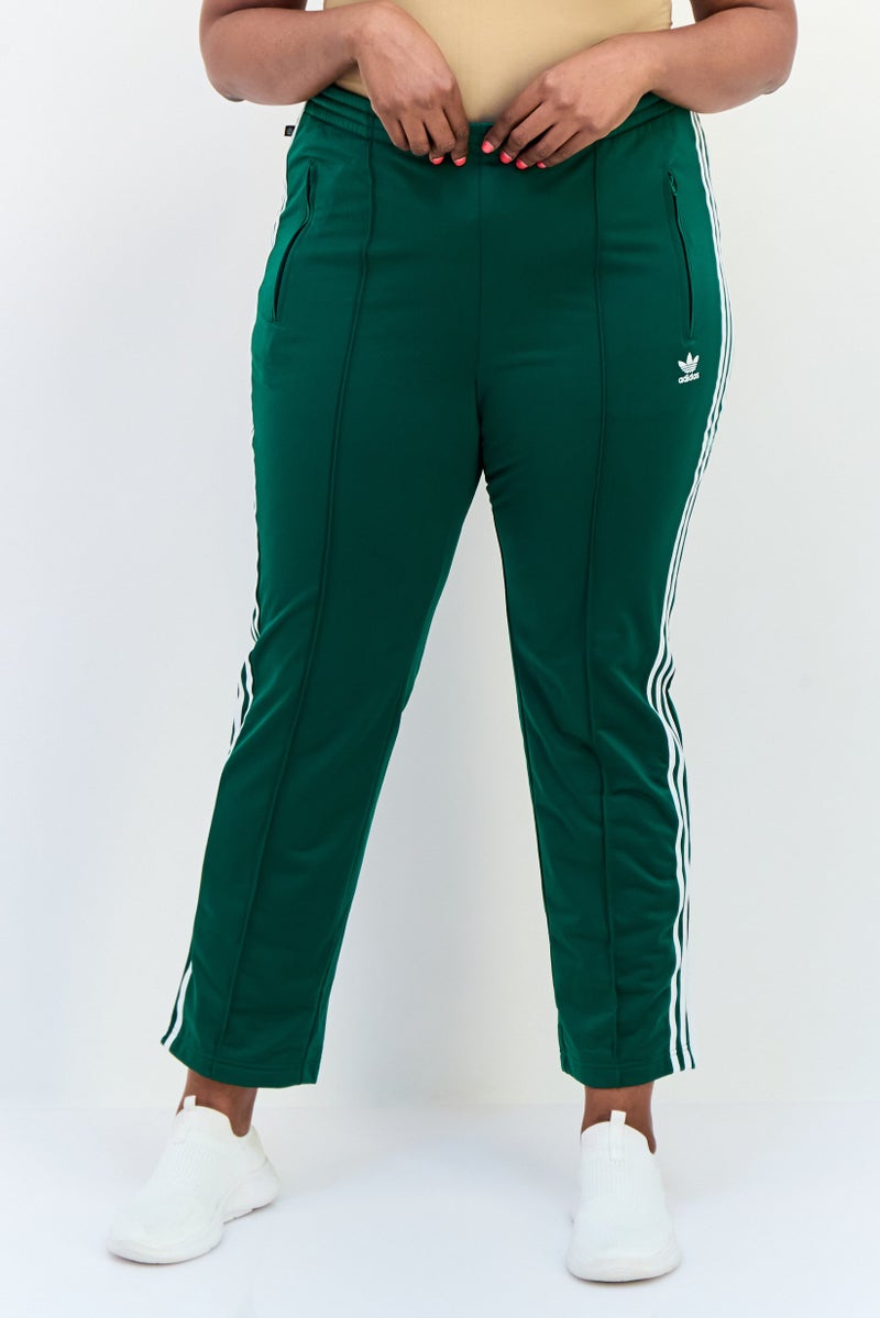 adidas Originals Women Plus Size Embroidered Logo Outdoor Sweatpants, Green  - Image 1