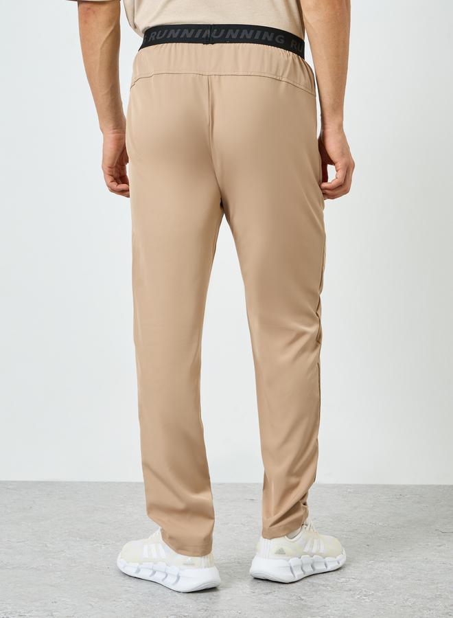 Styli Active Men Beige Graphic Training Track Pants - Image 4