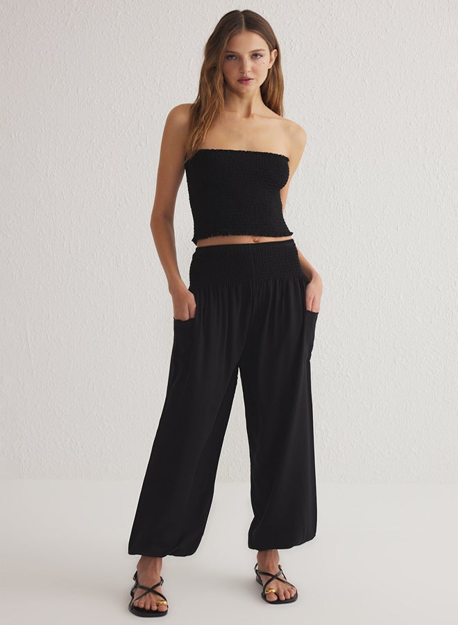 trendyol Black Trousers Elasticated Shalwar Form Woven Trousers - Image 1