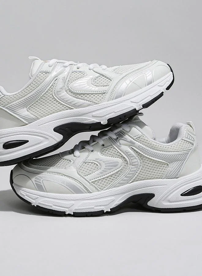 تايك تو حذاء جري برباط غلق وتفاصيل شبكية