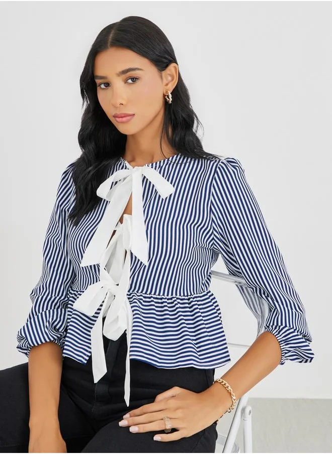 تايك تو Take Two Striped Ruffled Hem Tie-Up Detail Top