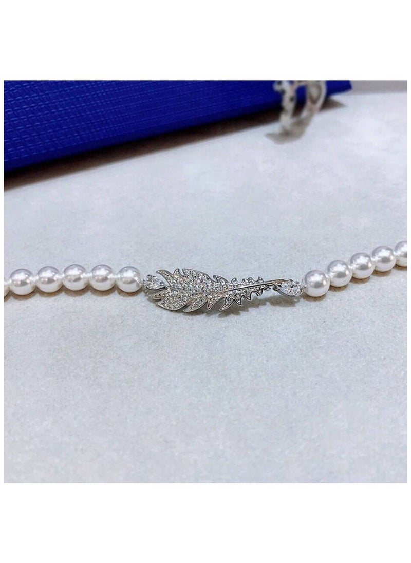 Generic - SWAROVSKL Elegant Feather Pearl Element Bracelet - Image 1
