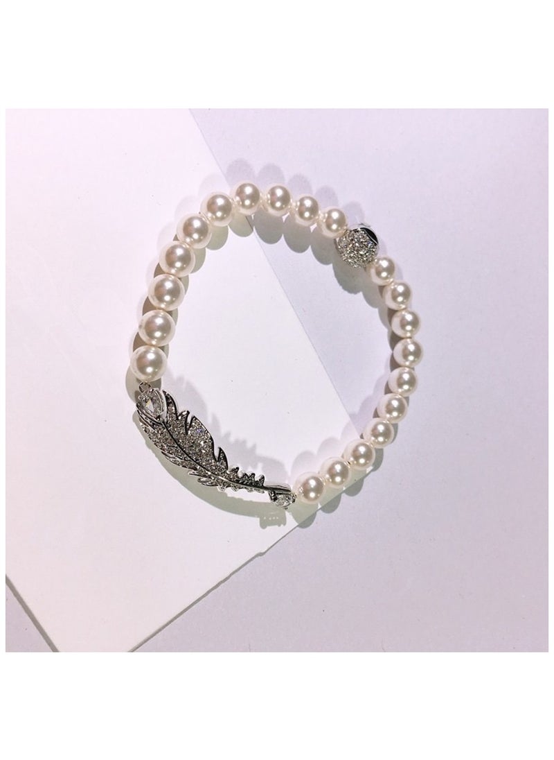 Generic - SWAROVSKL Elegant Feather Pearl Element Bracelet - Image 1