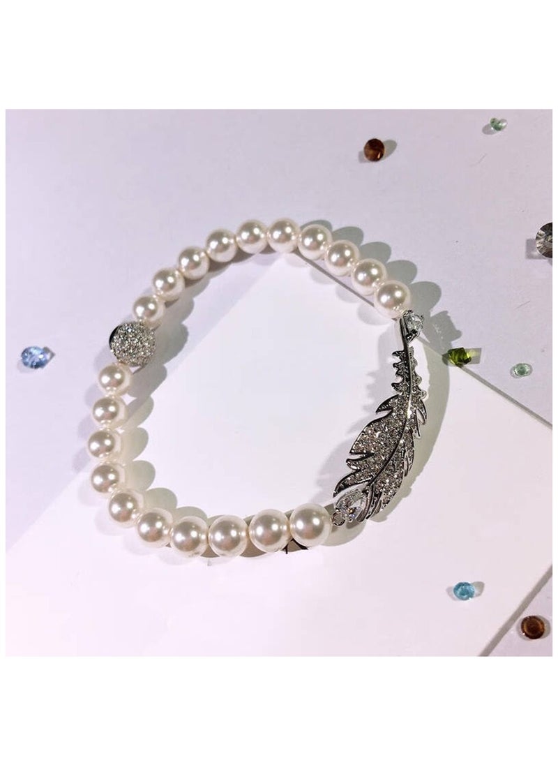 Generic - SWAROVSKL Elegant Feather Pearl Element Bracelet - Image 1