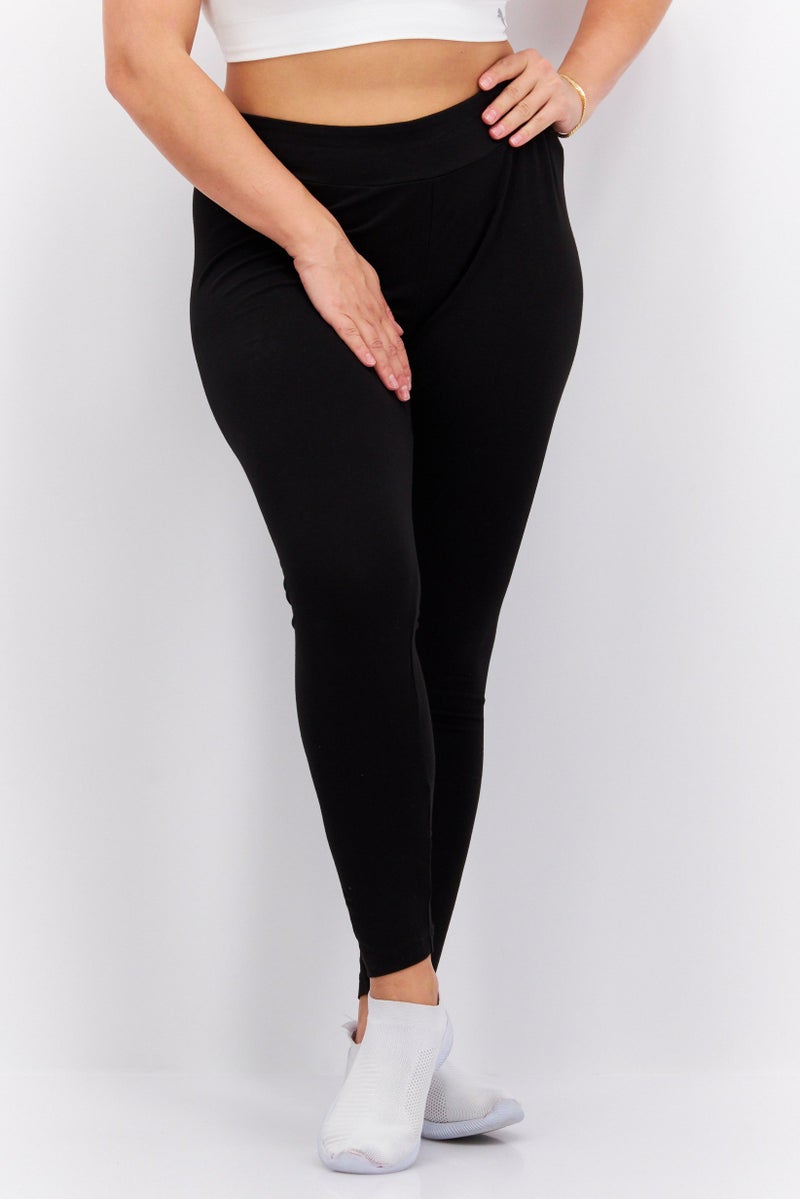 PUMA Women Tight Fit Solid Training Leggings, Black - Image 1