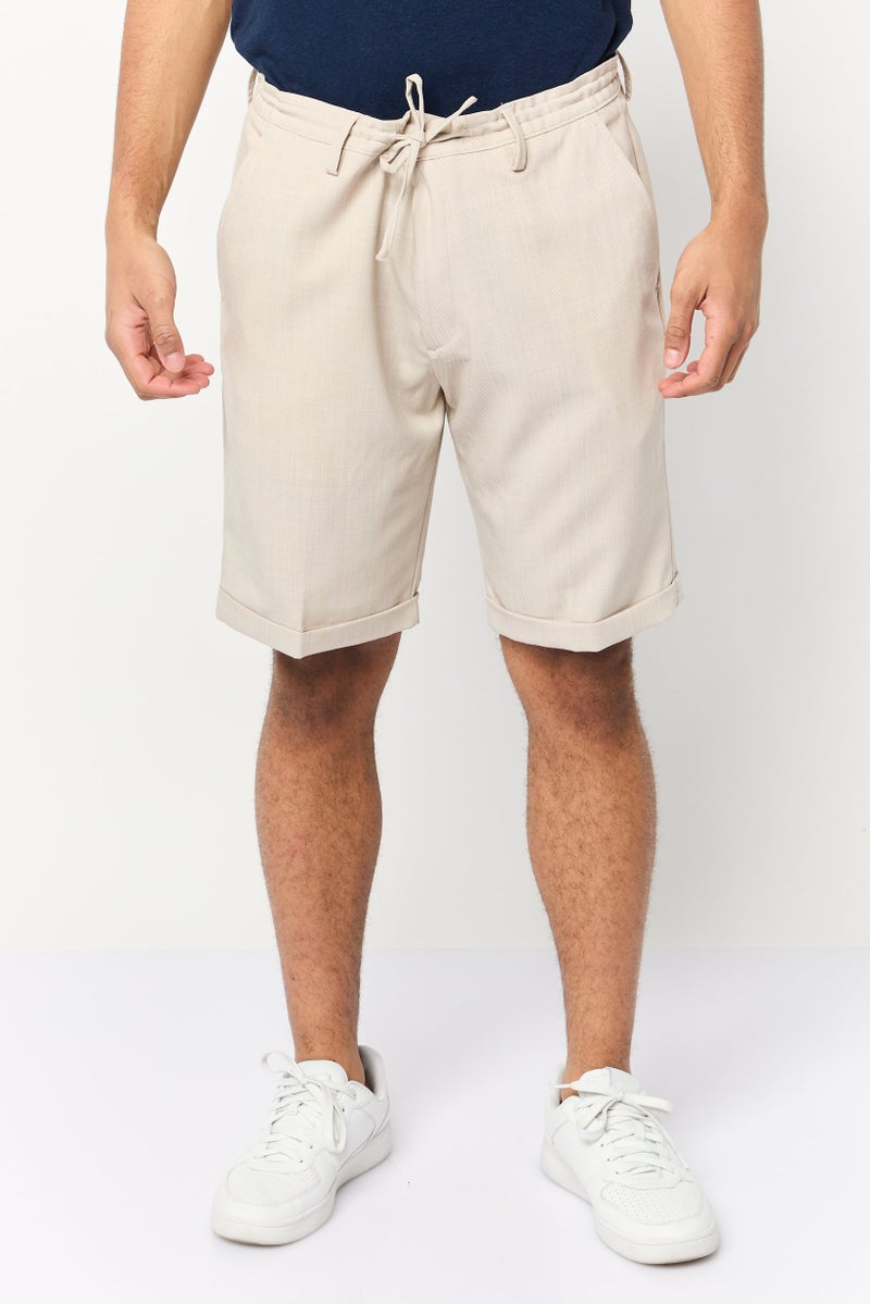 Celio Men Solid Basic Shorts, Beige - Image 1