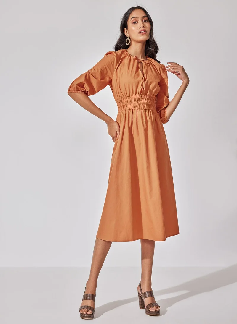 The Label Life Caramel Smocked Midi Dress