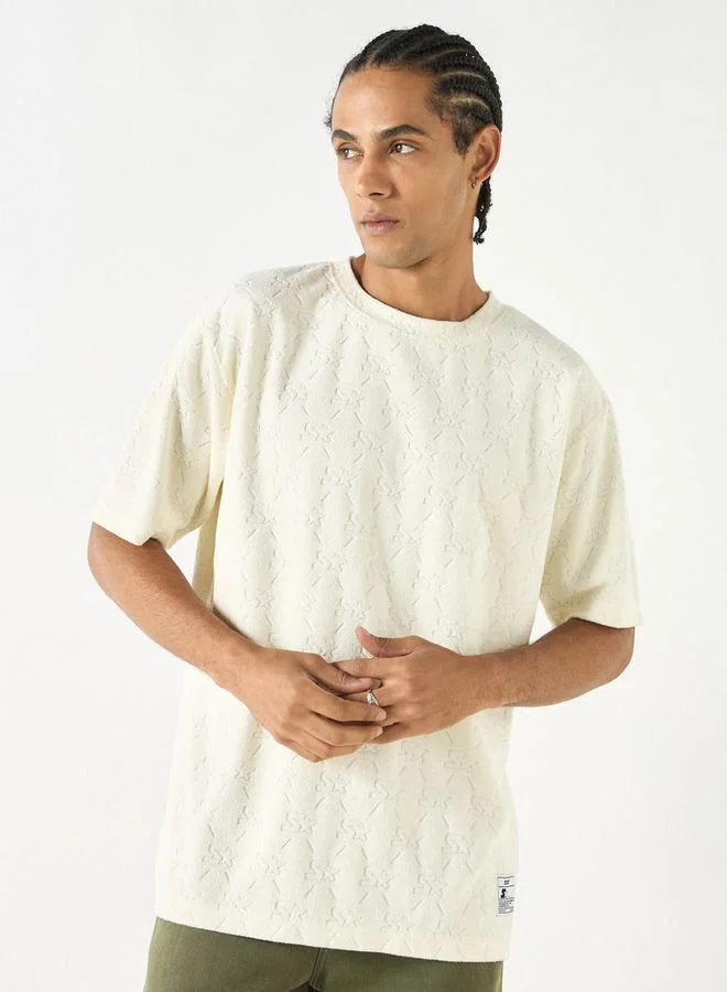 ستارتر كنزة بارزة الملمس بياقة ضيقة وأكمام قصيرة من ستارتر