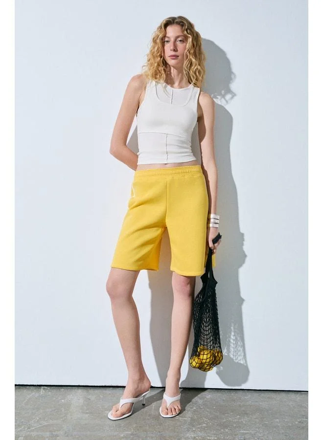 Grimelange UYUNI Women's Soft Organic Fabric Stripe Detailed Double Pocket Yellow Capri.