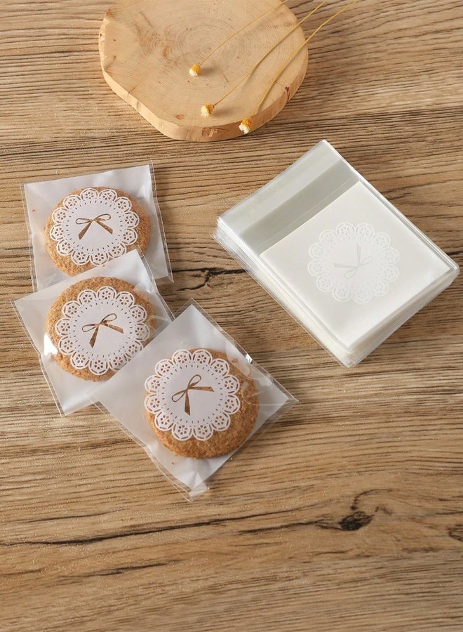 100 Pieces 3x3 Inch Self Adhesive Cellophane Cookie Bags, White Clear Bowknot Candy Bags, Suitable for Baked Goods, Desserts, Soaps, Cookies  - Image 1