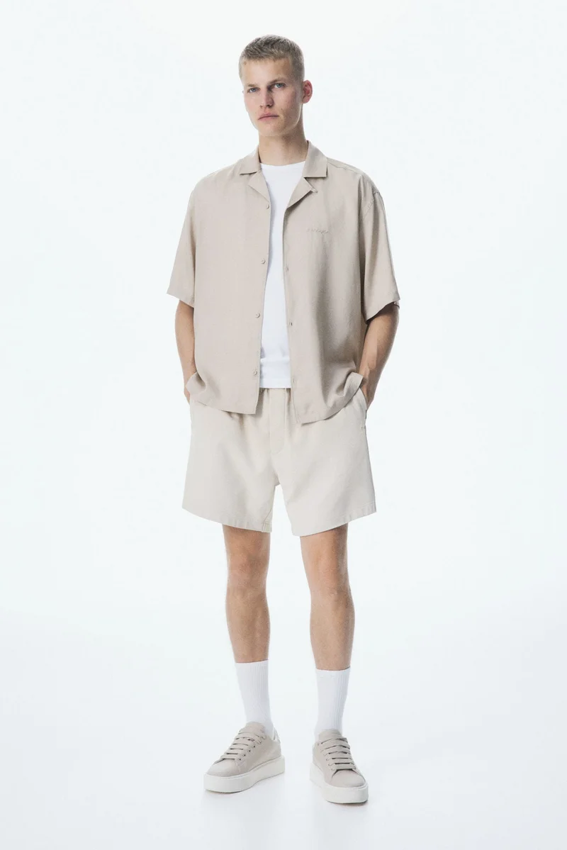 اتش اند ام قميص ريزورت بقصة واسعة