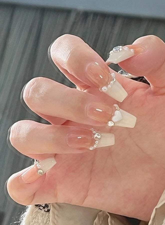 NIBEMINENT 24 قطعة أظافر صناعية، أظافر صناعية في علبة، أظافر صناعية طويلة ومسطحة على شكل رأس مسطح بلون أبيض لامع، أحجار الزركون اللؤلؤية على شكل قلب، رقعة أظافر صناعية - Image 1