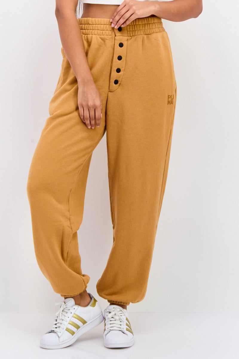 PUMA Women Relaxed Fit Outdoor Sweatpants, Brown  - Image 1