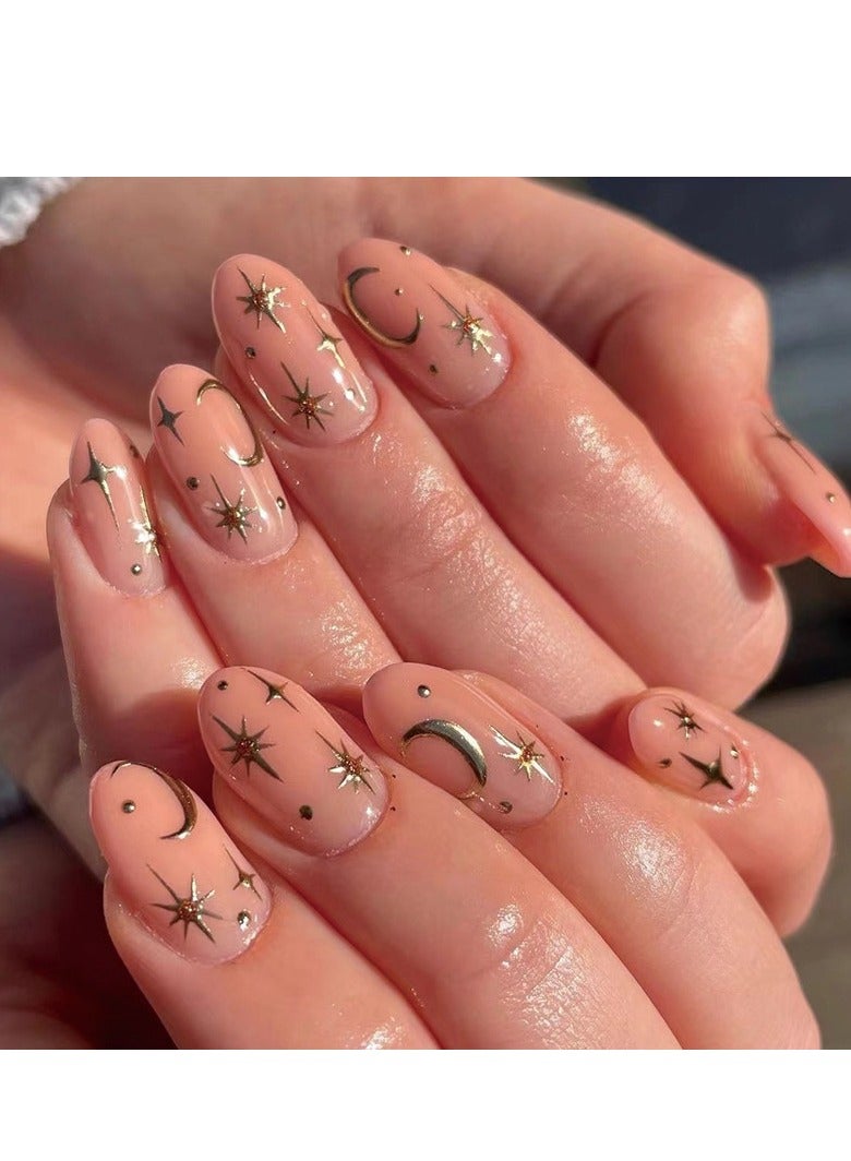 24 Pcs Short Press on Nails, Nude with Stars & Moon Print Fake Nails, Glossy Stick-on Nails with Gel Glue, Nail File, Cleaning Pad, Wooden Stick, Easy to Apply & Long-Lasting - Image 1