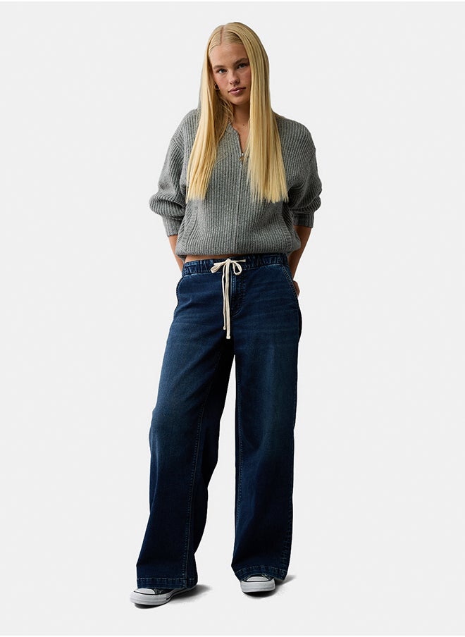 American Eagle - AE Dreamy Drape Cozy Low-Rise Baggy Wide-Leg Jean - Image 1