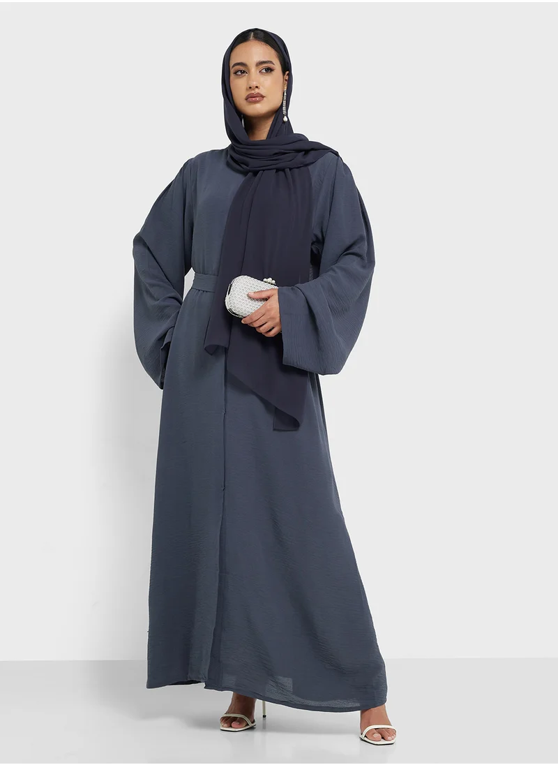 هيا كلوزيت Flared sleeve belted Abaya with Sheila