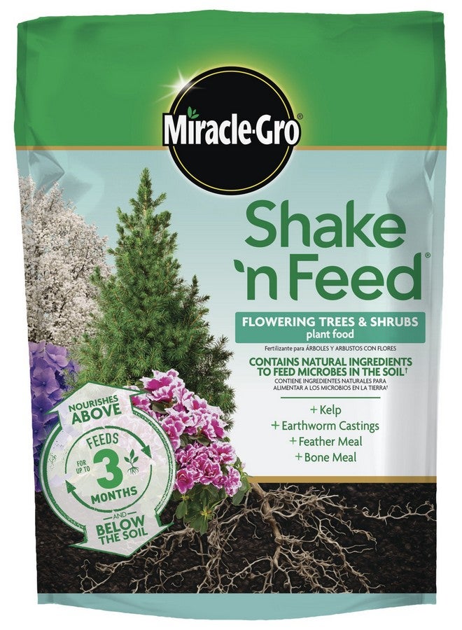 ميركل-جرو Miracle-Gro Shake 'N Feed، غذاء للنباتات المزهرة والشجيرات، للنباتات المزروعة في الأرض وفي الحاويات، نباتات مزهرة محبة للأحماض، 8 رطل.  - Image 1