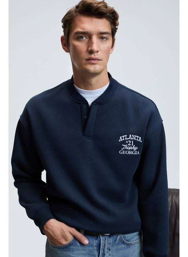 Grimelange JETHRO Men's Bomber Collar Patch Button Chest Embroidered Relaxed Fit Navy Sweatshirt.