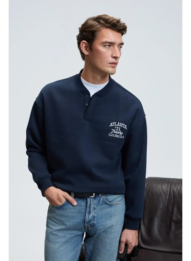 Grimelange JETHRO Men's Bomber Collar Patch Button Chest Embroidered Relaxed Fit Navy Sweatshirt.