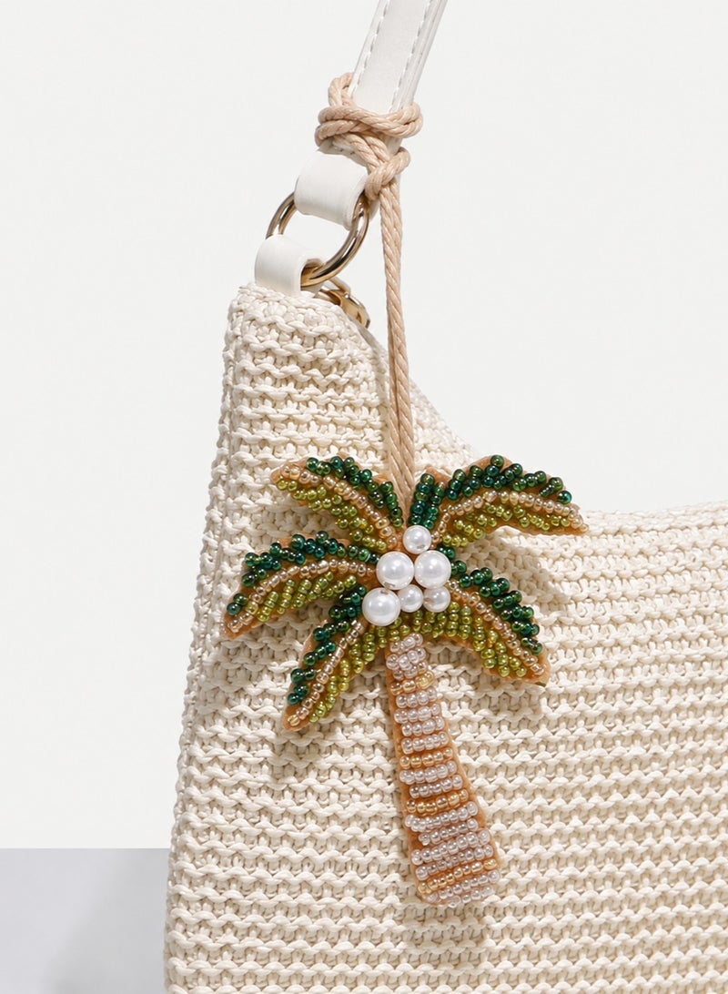 Saudi National Day Decoration – Palm Tree Bag Charm
A beautifully crafted bag charm featuring a palm tree design, made with delicate, shiny, and colorful beads. It adds a unique touch to your keys or bag and comes with a wrist strap for easy carrying and everyday use.
Can be used as a keychain or bag accessory.
Perfect for Saudi National Day celebrations and decorations. - Image 2