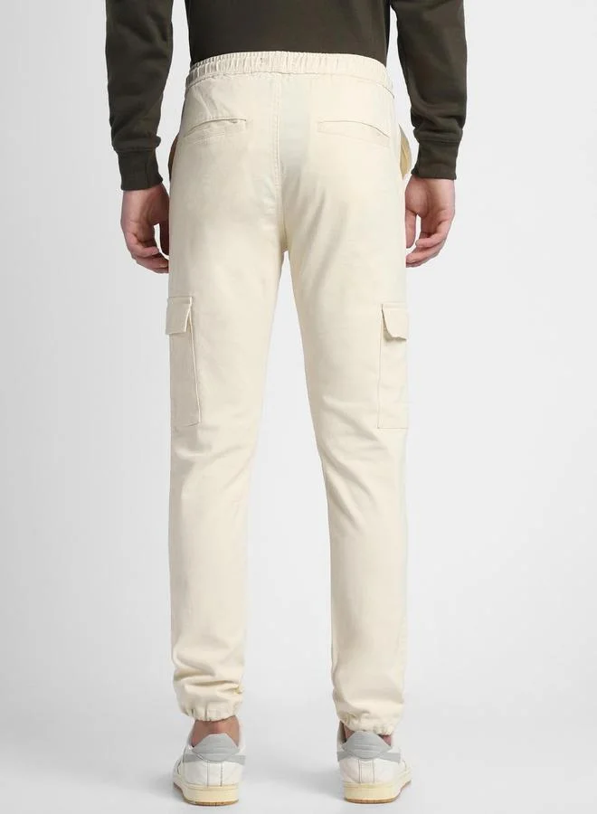 Dennis Lingo Slim Fit Cream Men's Cotton Lycra Solid Cargo Trouser, Mid Rise, Full Length, Casual,