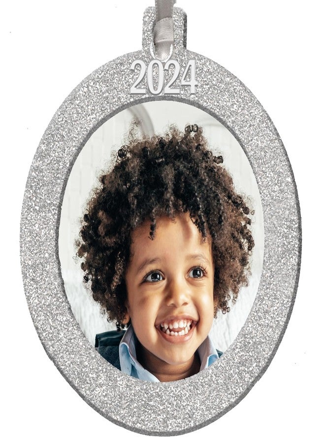 Expressly Yours! Photo Expressions 2024 Photo Ornaments for Christmas Tree, Sparkly Glitter Christmas Frame Ornament, Easy-Load Magnetic Design, Includes Satin Ribbon with Silver Charm Plus Photo Protector, Round, Silver - Image 1