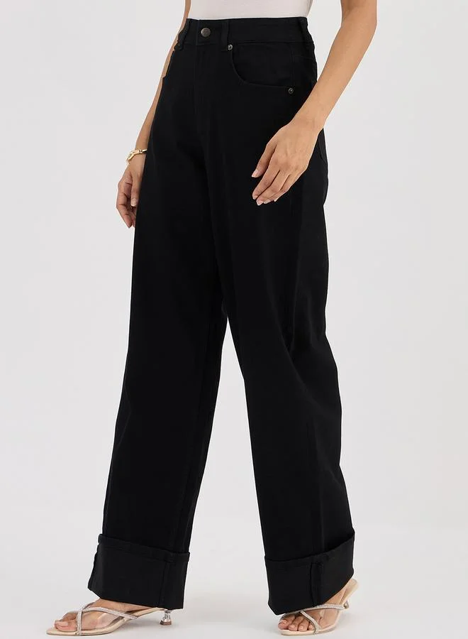 فيميلا جينز بأرجل واسعة وخصر متوسط