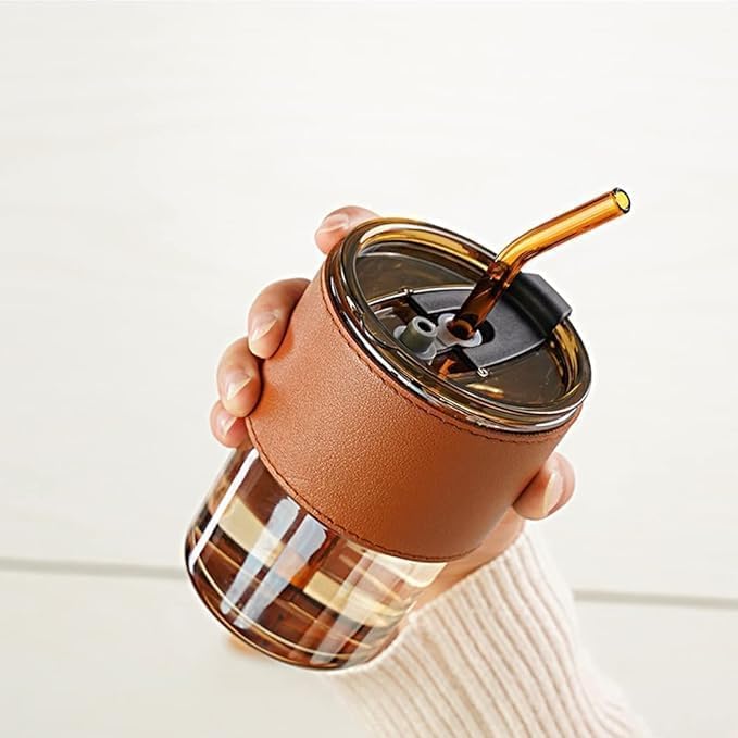 SKDBPM Reusable Glass Coffee Sipper Mugs with Lid & Straw Pack of 1, 400ml Multipurpose Drinking Glasses Tumbler with Leather Sleeve Cup for Juice Smoothies Iced Tea Home & Travel - Image 1