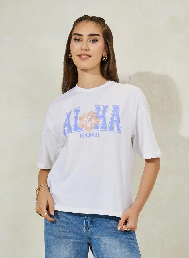 ستايلي Boxy Fit Dropped Shoulder Aloha Embroidered T-Shirt