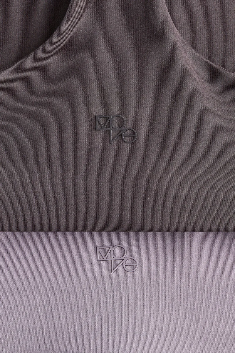 اتش اند ام حمالة صدر رياضية بدعم متوسط - عبوة قطعتين