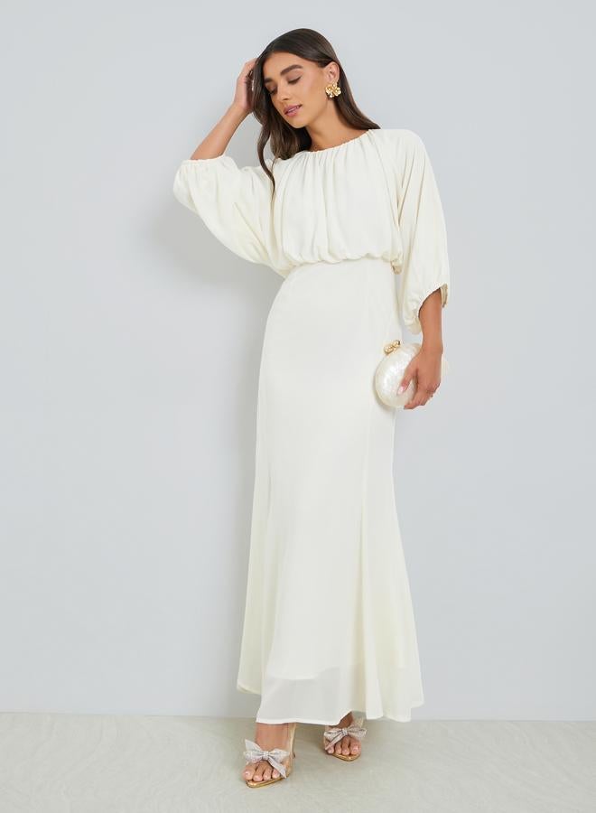 ستايلي فستان طويل بحافة حورية البحر لون كريمي - Image 1