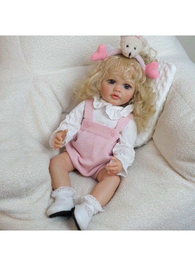 ان بي كي دمية طفلة واقعية من ريبورن، طولها ٢٢ بوصة، ترتدي سترة وردية فاتحة وحمالات. دمية طفلة جميلة ونابضة بالحياة. مصنوعة يدويًا من السيليكون والفينيل الناعم. مجموعة لعب واقعية لطفلة ريبورن. - Image 1