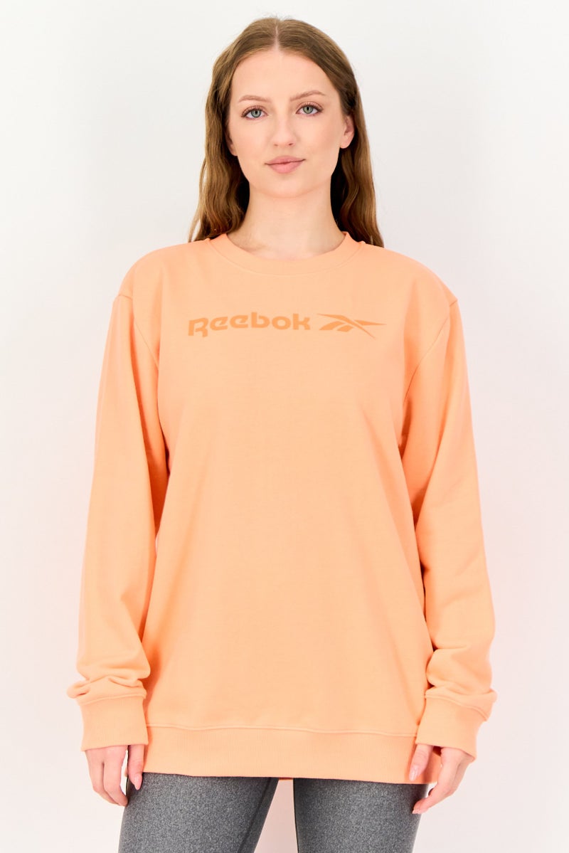 Reebok Women Sportswear Fit Long Sleeve Outdoor Sweatshirt, Peach - Image 1