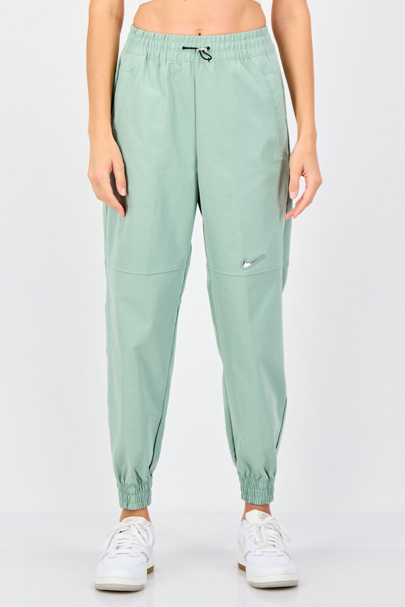 Nike Women Standard Fit Solid Outdoor Sweatpants, Sage Green - Image 1
