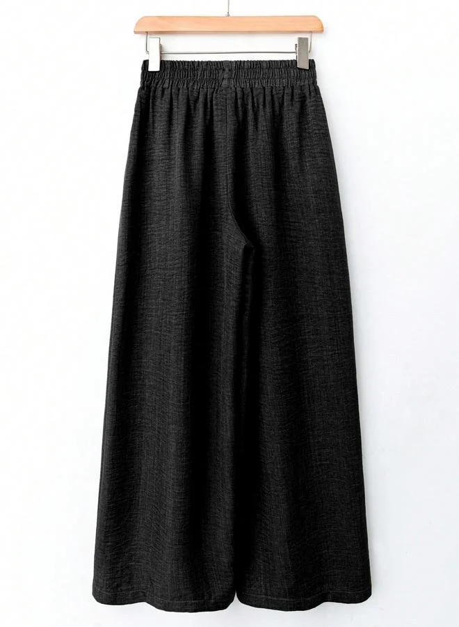 تايك تو بنطال بارز الملمس بأرجل واسعة