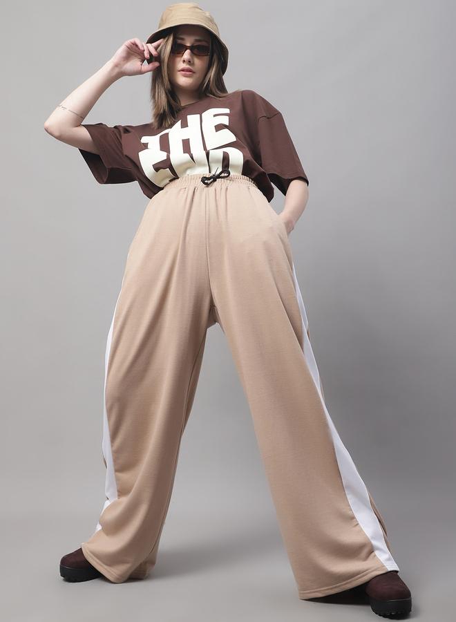 تايك تو بنطلون رياضي بيج واسع الساق بخط جانبي من دور - Image 5