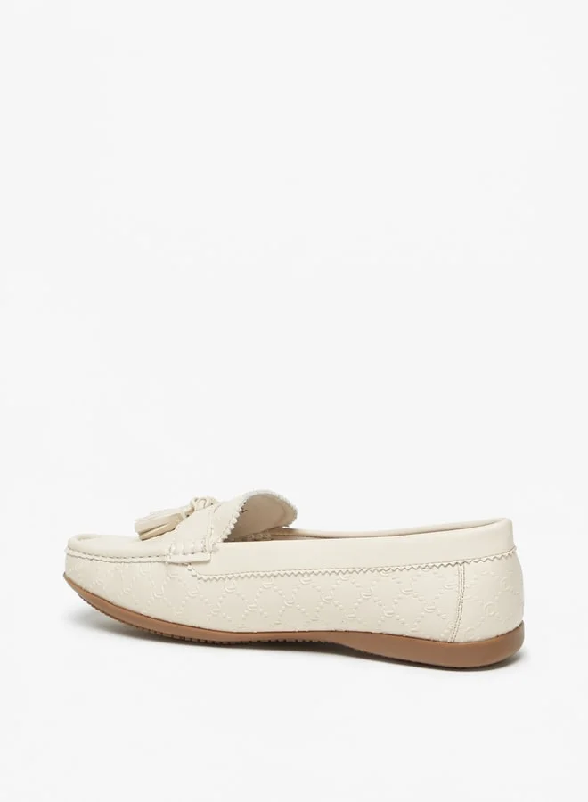Le Confort Women Monogram Embossed Slip-On Loafers With Tassel Detail