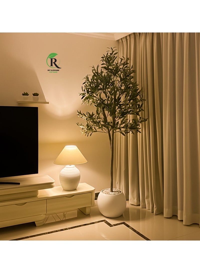 Al-Rawasem House A fruitful olive tree with a large, attractive female pot. Enjoy more elegance with sizes 180cm, 150cm, 220cm, and 100cm. - Image 1