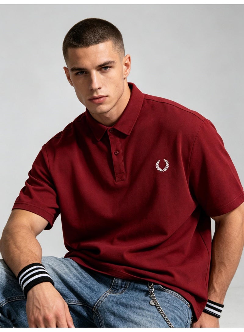 فريد بيري Fred Perry unisex plain laurel wreath Polo shirt, breathable embossed knitted short sleeves, simple casual shirt for men and women. - Image 1