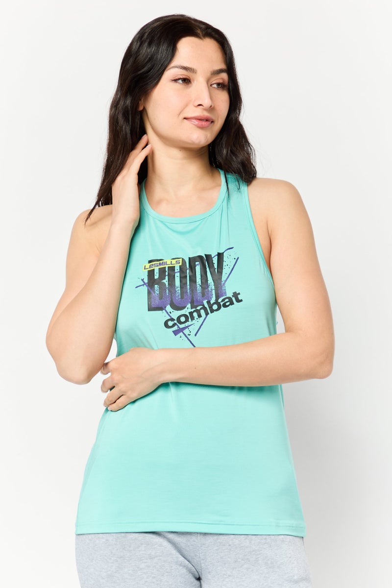 Reebok تي شيرت تدريب بلا أكمام للنساء، أخضر نعناعي - Image 1