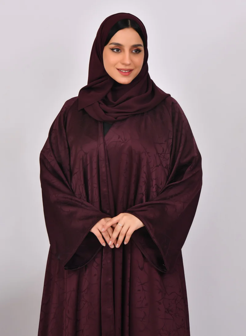 HAWRAA ABAYA Cloche abaya in burgundy with wide sleeves