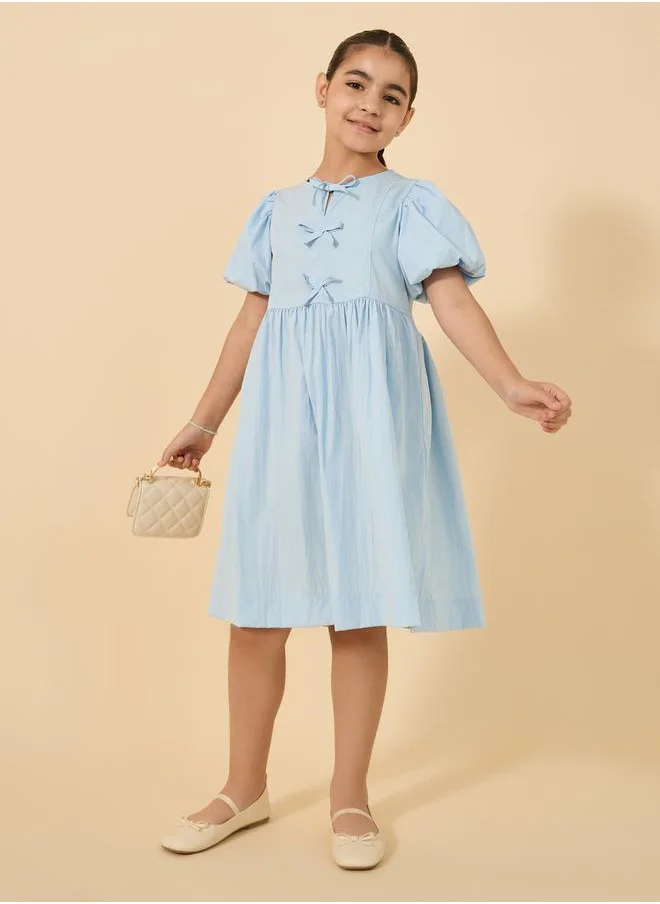 Styli Puff Sleeve Bow Detail Round Neck Dress